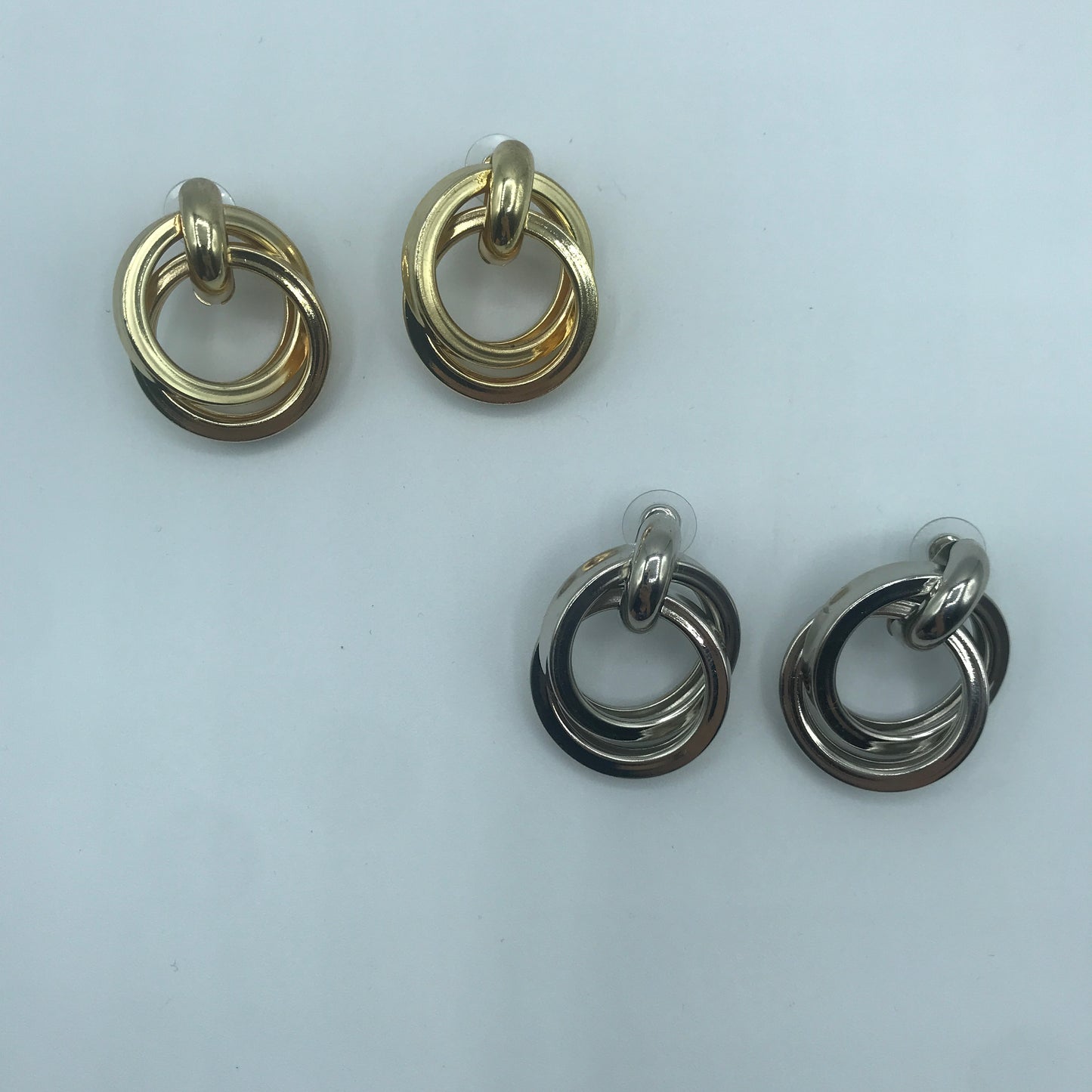 Dual crossed earrings