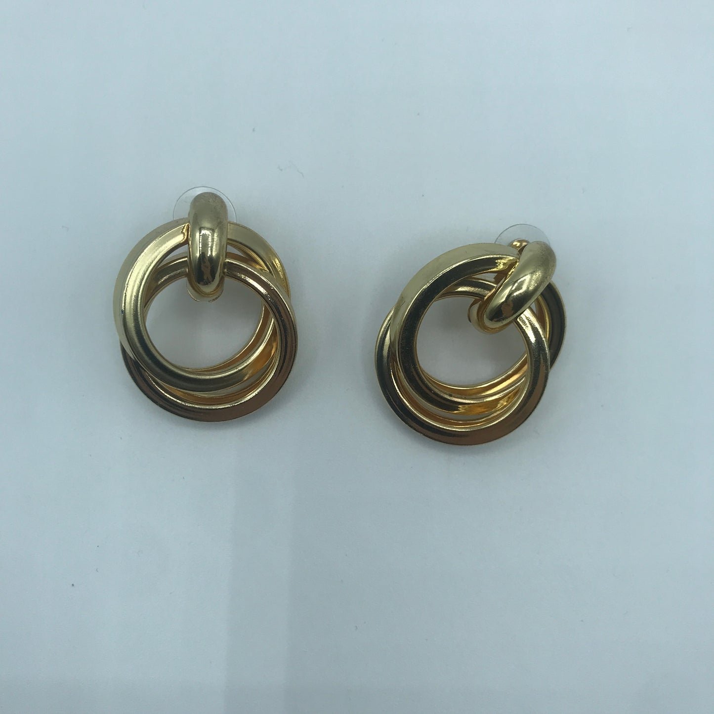 Dual crossed earrings