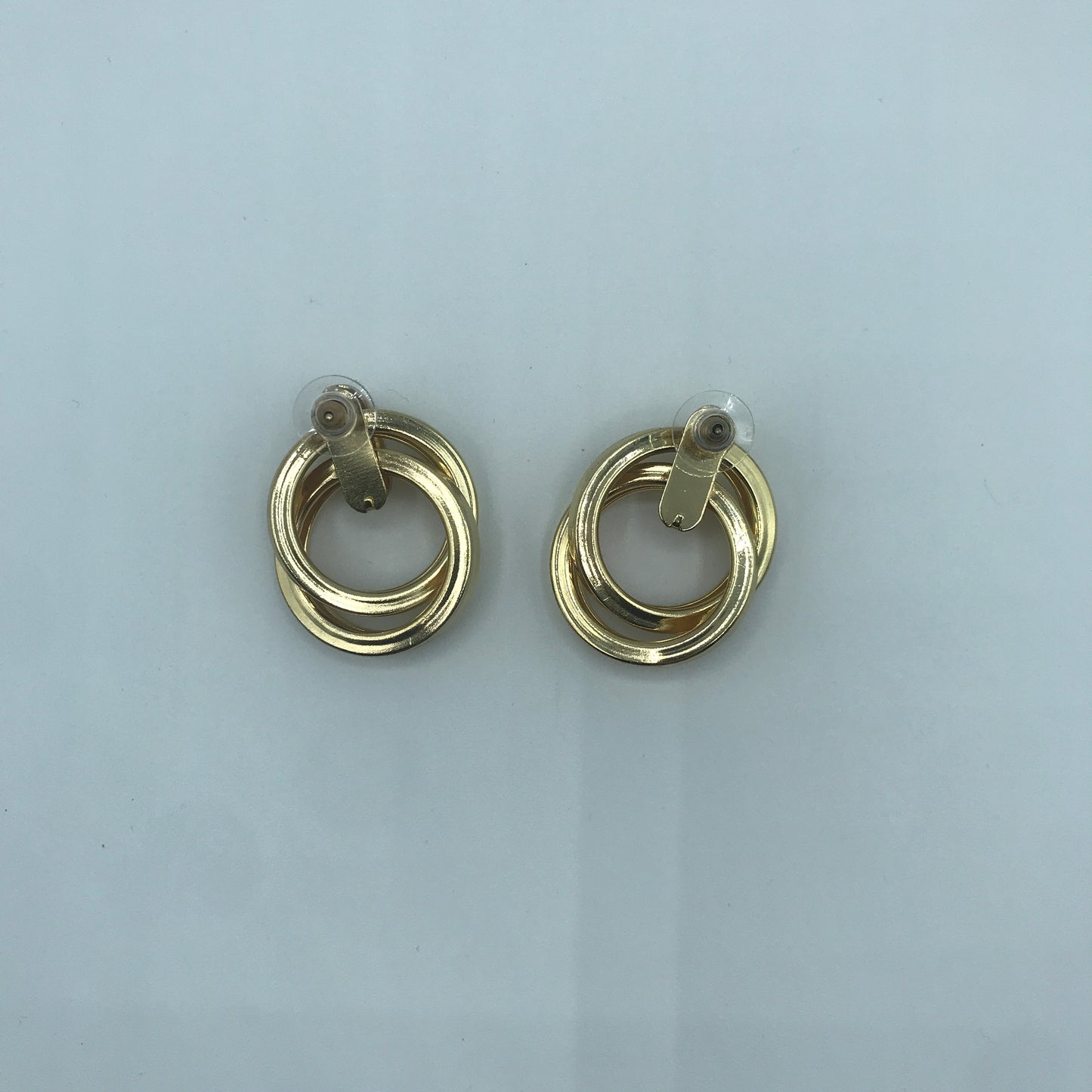 Dual crossed earrings
