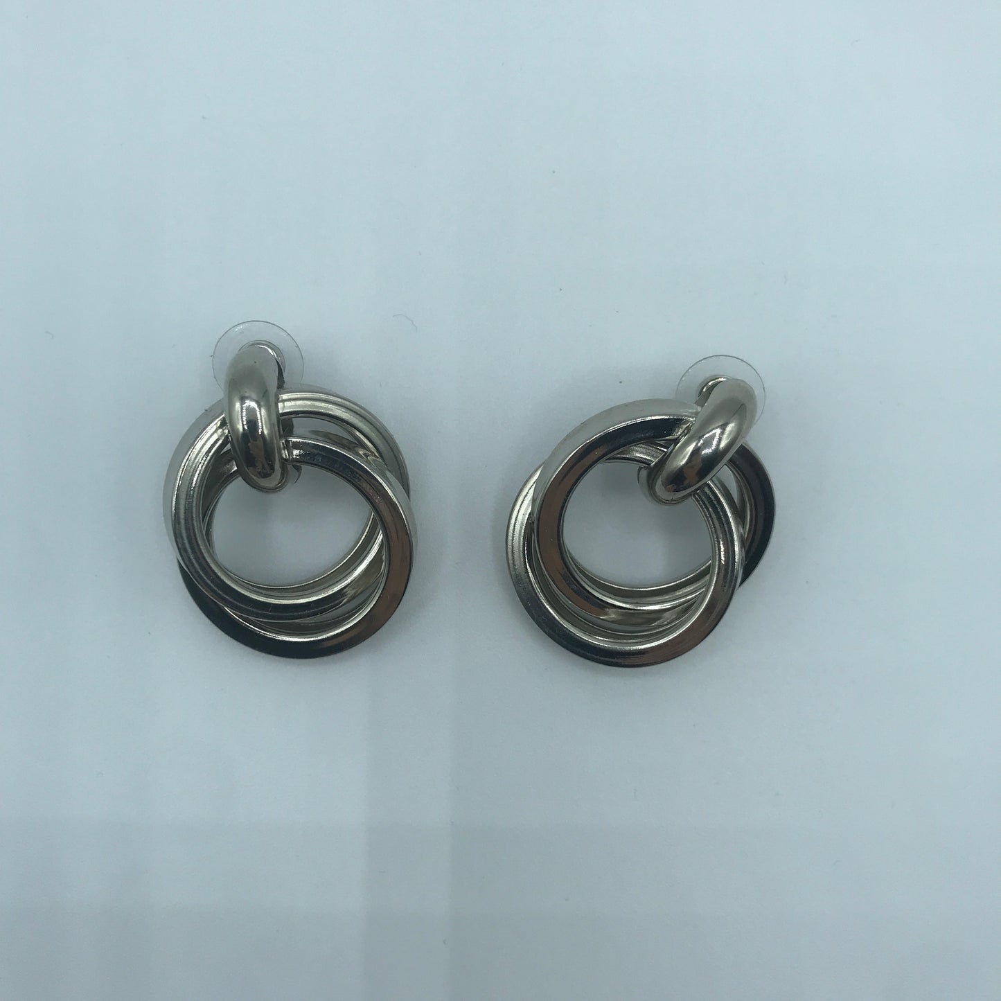 Dual crossed earrings