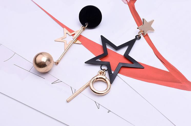 Asymmetric Black Gold Star Slinky Earrings