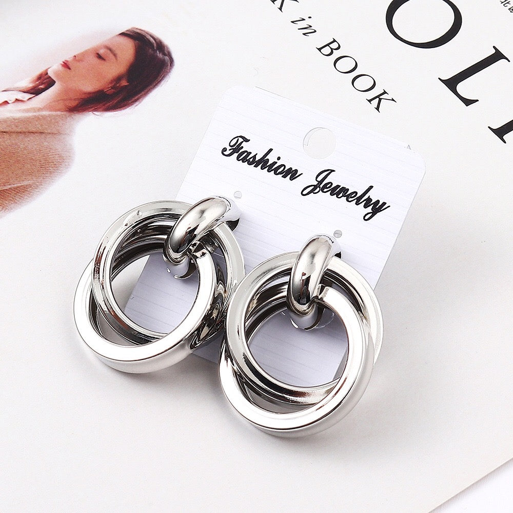 Dual crossed earrings