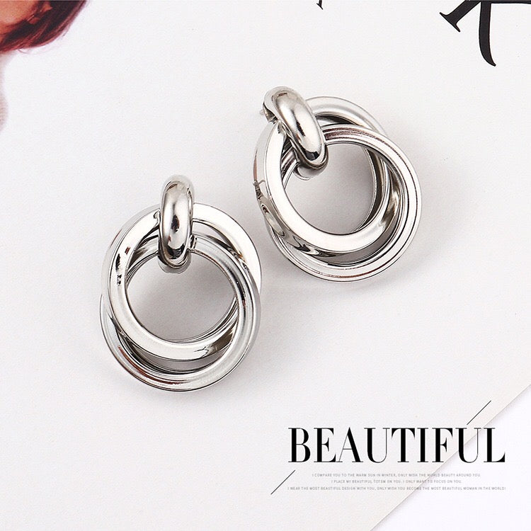 Dual crossed earrings