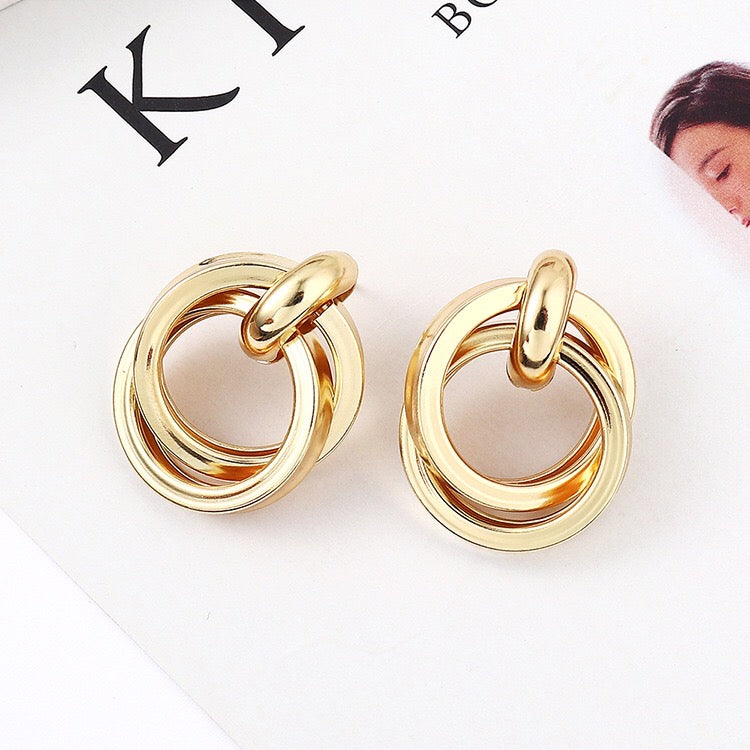 Dual crossed earrings