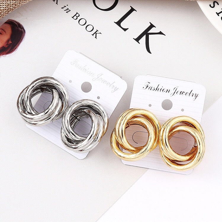 Crossed hoop earrings