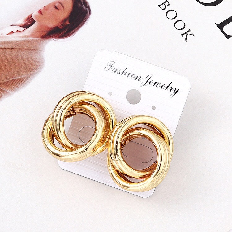 Crossed hoop earrings