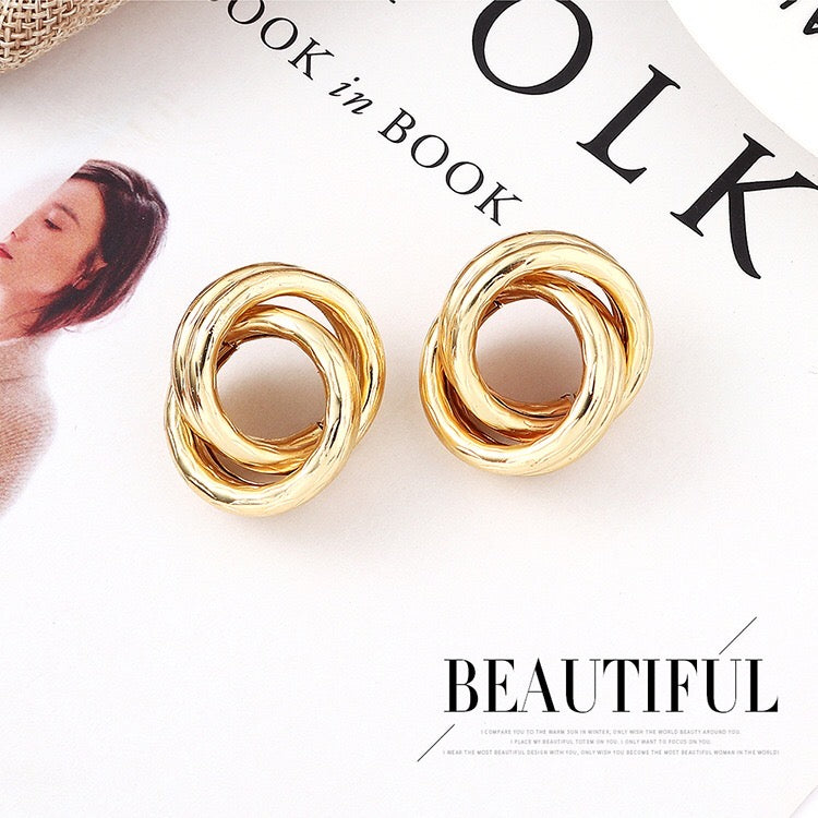 Crossed hoop earrings