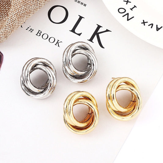 Crossed hoop earrings