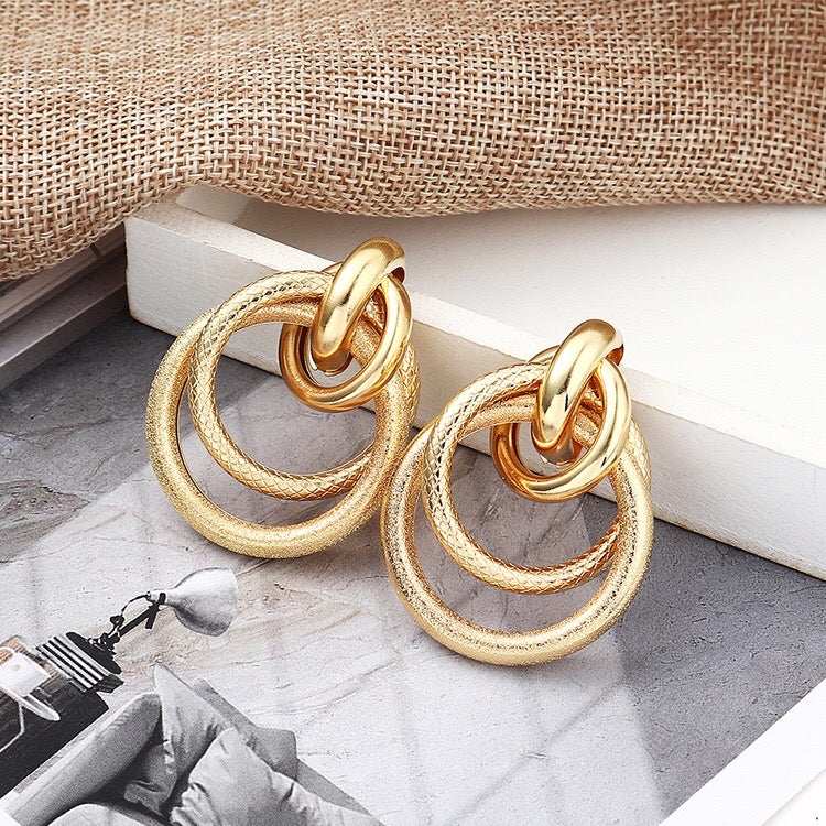 Multi hoop snake pattern earrings